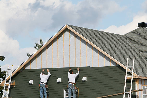 Professional Siding Contractor technician working in Dunn, NC